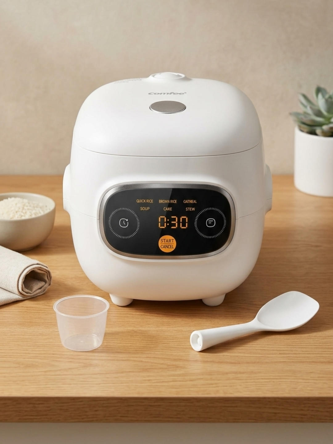 Close up of the digital touch control panel on the Comfee mini rice cooker