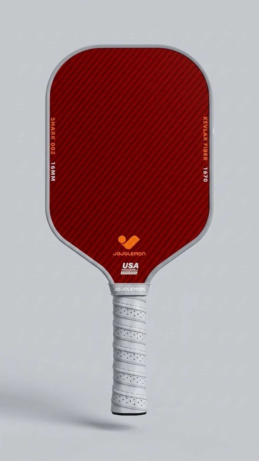 A red carbon fiber pickleball paddle with a white grip and gray edge, viewed from the front against a light gray background.